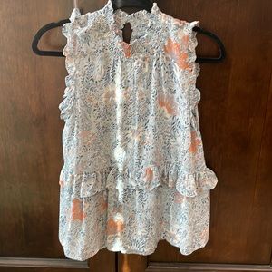 Floral print sleeveless blouse, never worn